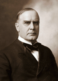 President McKinley signs Gold Standard Act, March 14, 1900 